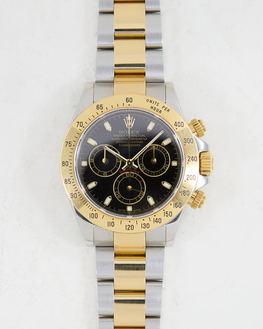 ROLEX DAYTONA BLACK DIAL IN STEEL & GOLD ON OYSTER BRACELET